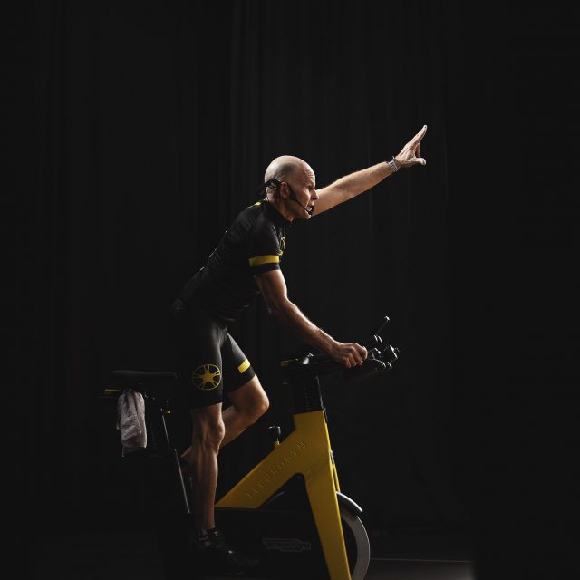 Fitness group cycling Trainer Tom